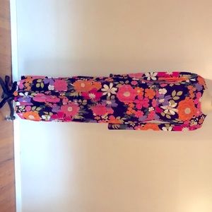 Long dress /  sleeves / key hole back .Fabric see through slightly /stretchy